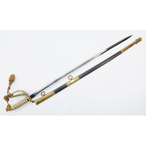 540 - A British early 20th century Naval Officers’ sword, regulation blade etched and polished with with r... 