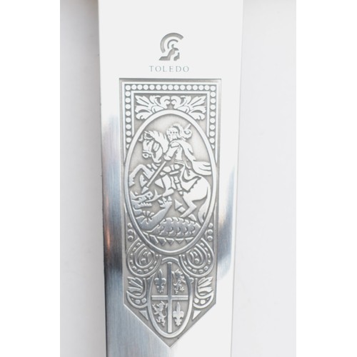 546 - A Knights Templar reproduction dagger, the 27cm blade stamped Toledo, scabbard

This product is not ... 