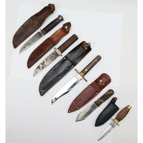 550 - A vintage sheath knife, the 12cm blade by Fagan of Sheffield,  and four other knives,

This bladed p... 