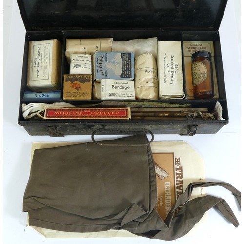 555 - A WWII medical kit in a metal box, 31 x 16 x 8cm