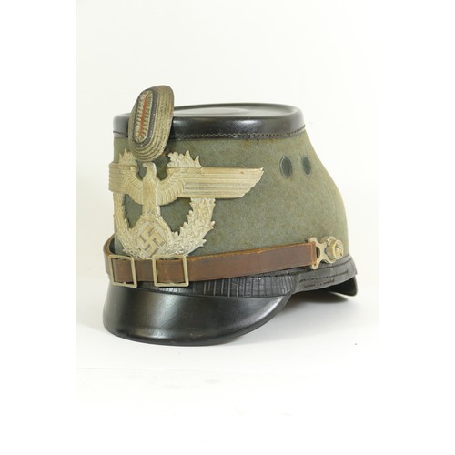 556 - WWII German Schutzpolizei (Police) Shako, green felt covered body patent shako with painted alloy fr... 