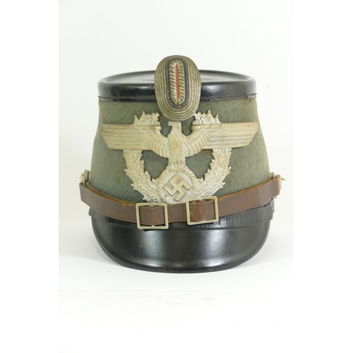 556 - WWII German Schutzpolizei (Police) Shako, green felt covered body patent shako with painted alloy fr... 