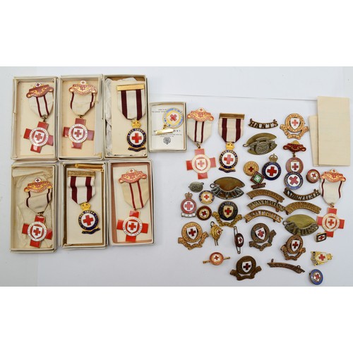 579 - A collection of British Red Cross medals and badges