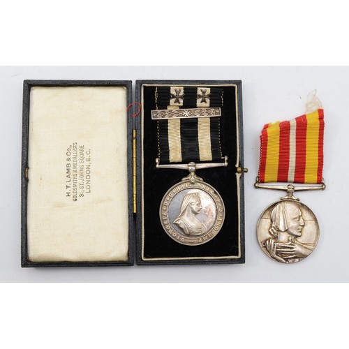 580 - A British Red Cross Long Service medal, awarded to Mrs Winifred Baker and a St. John Long Service me... 