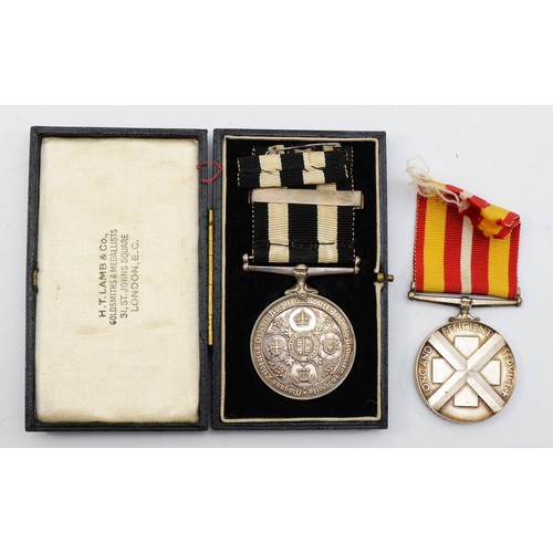 580 - A British Red Cross Long Service medal, awarded to Mrs Winifred Baker and a St. John Long Service me... 