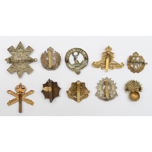 581 - Ten military cap badges, including the Black Watch