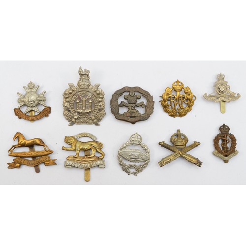 583 - Ten military cap badges, including the Machine Gun Corp and RAF