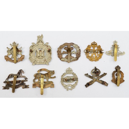 583 - Ten military cap badges, including the Machine Gun Corp and RAF