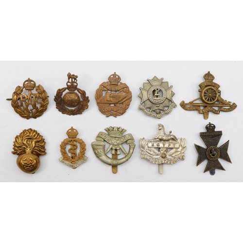 585 - Ten military cap badges, including the Tank Corp and Royal Marines