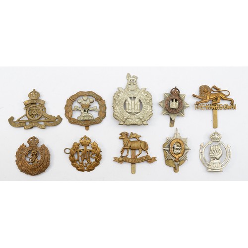 586 - Ten military cap badges, including the Queens and Royal Armoured Corp