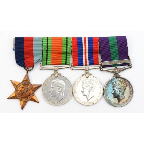 604 - WWII mounted group of four, 1939-1945 Star, Defense, War and G.S.M. with Palestine bar, named 186984... 