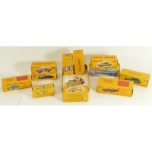 184 - A collection of eleven reproduction Dinky diecast model vehicles, boxed, together with an Atlas tin ... 