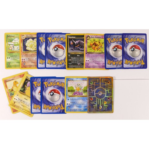 228 - Assortment of Pokemon trading cards comprising of three Charmander 46/102, Squirtle 63/102, Pikachu ... 