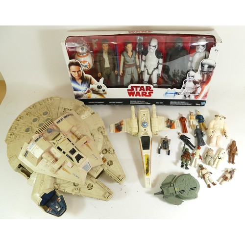 205 - A group of playworn Starwars figures and models to include the Millennium Falcon, and a boxed Disney... 