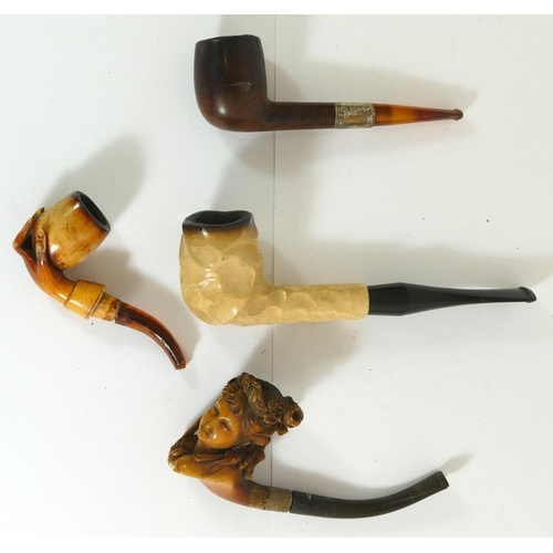 357 - A carved Meerschaum pipe of a 19th century lady, an Oppenheimer City de Luxe pipe, boxed with paperw... 