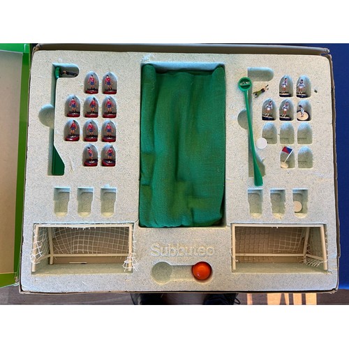 215 - Subbuteo; a 20th century boxed football game complete with pitch and accessories together with boxed... 