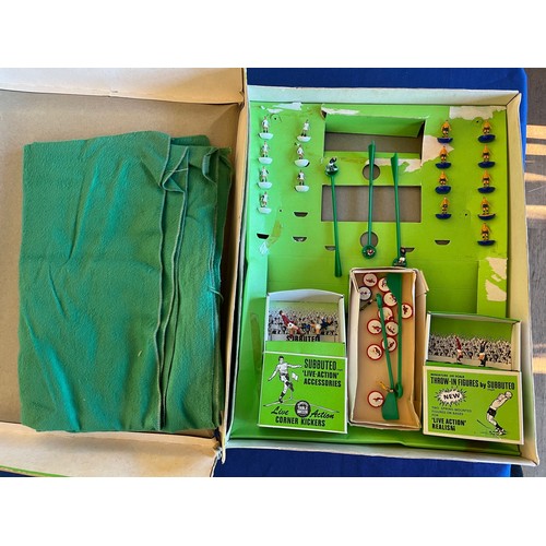 215 - Subbuteo; a 20th century boxed football game complete with pitch and accessories together with boxed... 