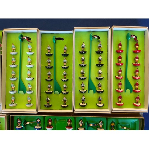 216 - Subbuteo; various scale model football teams together with various other accessories to include foot... 