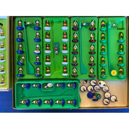 216 - Subbuteo; various scale model football teams together with various other accessories to include foot... 