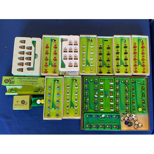 216 - Subbuteo; various scale model football teams together with various other accessories to include foot... 