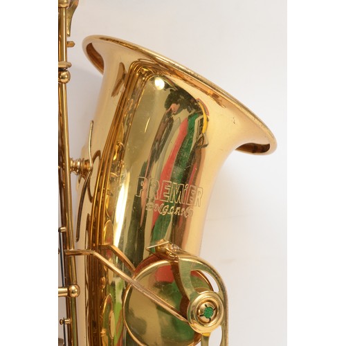 452 - A contemporary Premier alto brass saxophone, impressed 0919710, with engraved floral and leaf decora... 