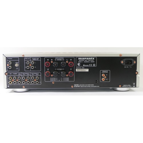 244A - Marantz, a silver PM7004 amplifier, with power lead and remote.