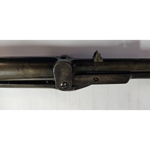 524 - An early 20th century BSA .177 underlever air rifle with walnut stock, serial number 10018.

This pr... 