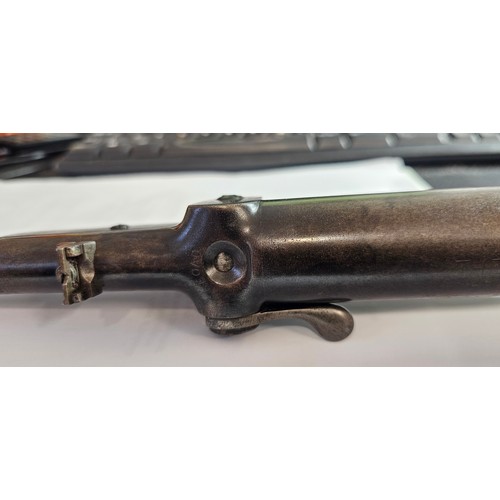 524 - An early 20th century BSA .177 underlever air rifle with walnut stock, serial number 10018.

This pr... 