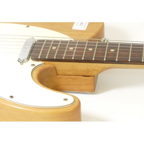 462 - A Fender Telecaster in natural ash with maple neck, pat 2573254/3143028. updated imagery, to show th... 