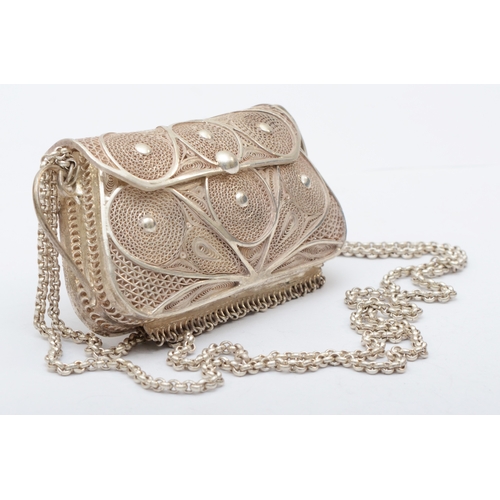 9 - An unmarked silver filigree purse, with belcher link chain, 10 x 5.5 x 3cm, 150gm