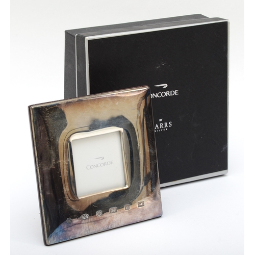 17 - Of Concorde interest; a silver photograph frame, by Carrs, Sheffield 2003 with commemorative Concord... 