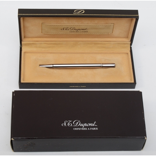 71 - S.T. Dupont, a stainless steel panelled ladies ball point pen, c.1989, booklet, guarantee card, case... 