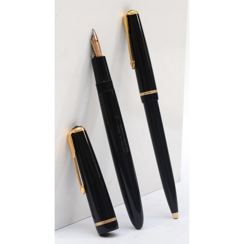 72 - A Parker Duofold black fountain pen, 14K gold nib, together with a matching biro, case