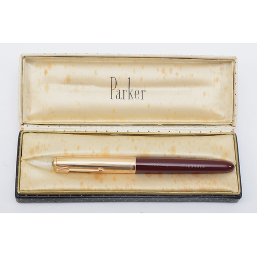 73 - A Parker 51 fountain pen, with gold plated cap and box.