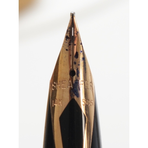 75 - Sheaffer, a gold plated fountain pen, with 14K gold nib and cartridge filling, case