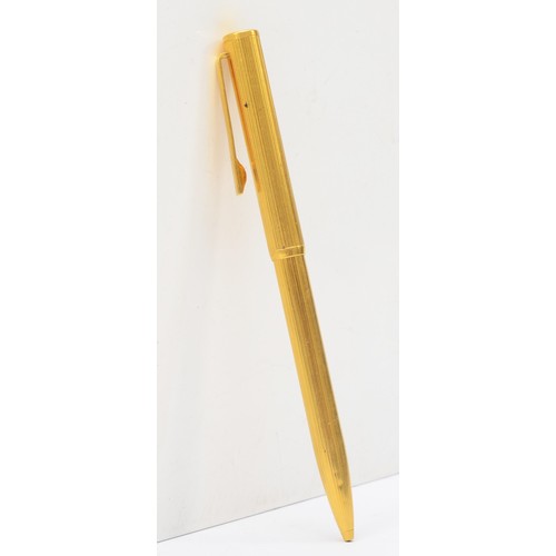 76 - Dunhill, a gold plated biro, ribbed body