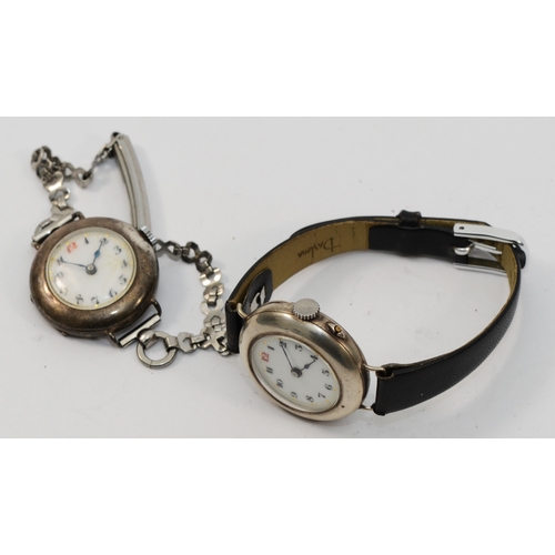 93 - A silver manual ladies wristwatch, London 1923, 25mm and another similar, London 1917, 28mm, both wi... 