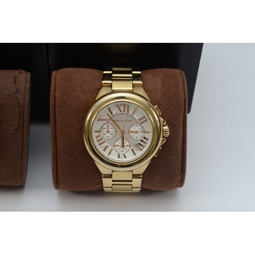 96 - Michael Kors, two boxed stainless steel gold plated quartz chronograph wrist watches, Camille MK- 56... 