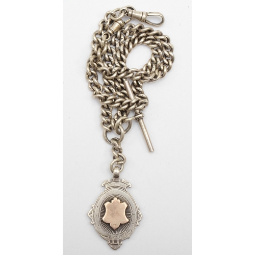 118 - An early 20th century silver t-bar curb link pocket watch chain, Birmingham 1905, with a silver and ... 