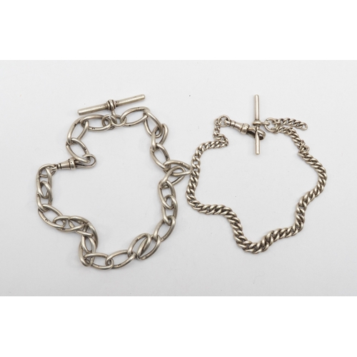 120 - An early 20th century graduating curb link watch chain, 29cm, together with another example, 61gm .