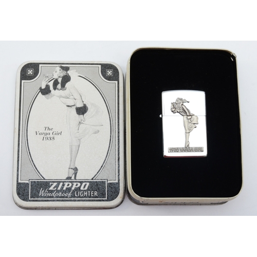 126 - Zippo, a collectors petrol lighter, 1935 Varga Girl, unused, in tin with paperwork dated 1994.