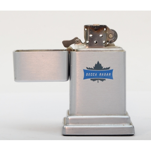 130 - Zippo, a Decca Radar table petrol lighter, 8.5cm