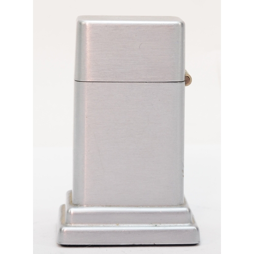 130 - Zippo, a Decca Radar table petrol lighter, 8.5cm