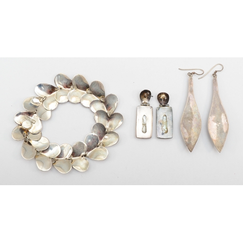 165 - Esposito, a silver heart shaped segmented bracelet, 21cm, together with two pairs of drop earrings, ... 