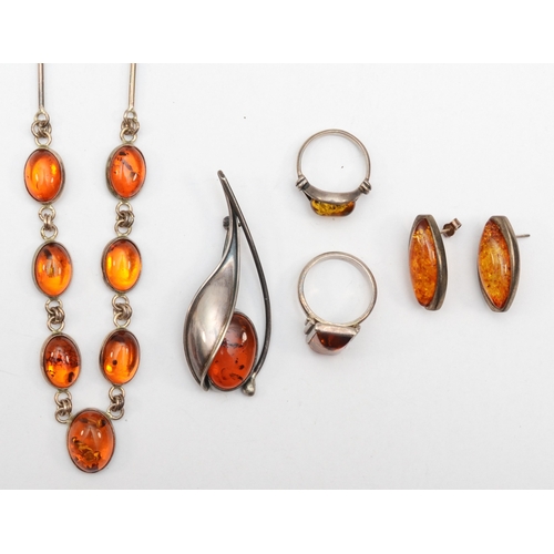 166 - A group of silver Baltic amber jewellery to include a segmented necklace, 49cm, 43gm.