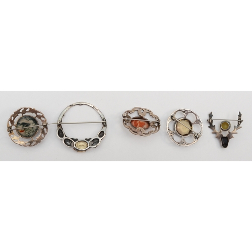 173 - A group of five Scottish silver brooches to include a Robert Allison citrine and thistle brooch, Gla... 