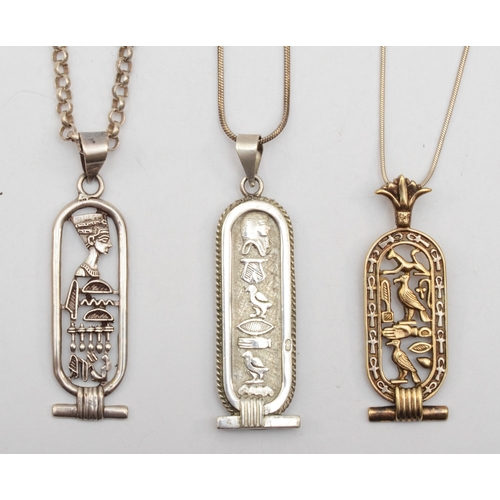 174 - Three silver Egyptian pendents on chains, largest 53mm, 42gm.