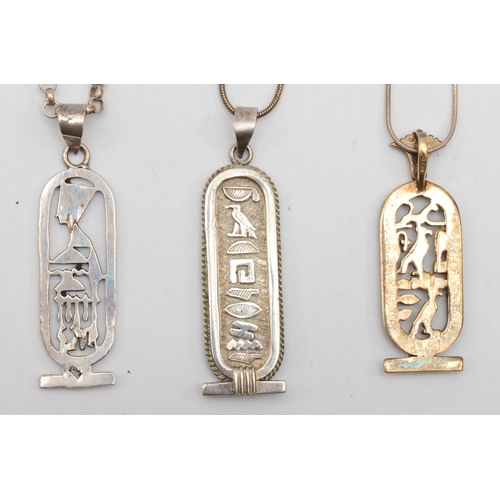 174 - Three silver Egyptian pendents on chains, largest 53mm, 42gm.