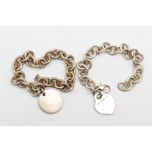 182 - Tiffany & Co, a silver identity bracelet with heart shaped tag, 17cm, together with a similar Tiffan... 