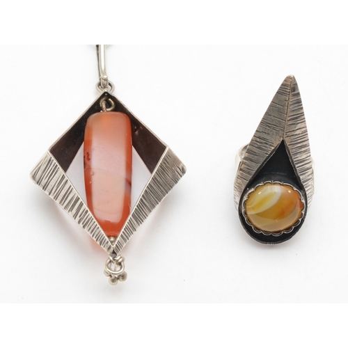 188 - A French silver modernist carnelian necklace, 68cm, together with a similar ring, M, 45gm.